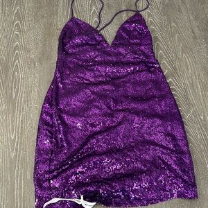 Purple sparkly bodycon Lucy in the sky party party dress.
